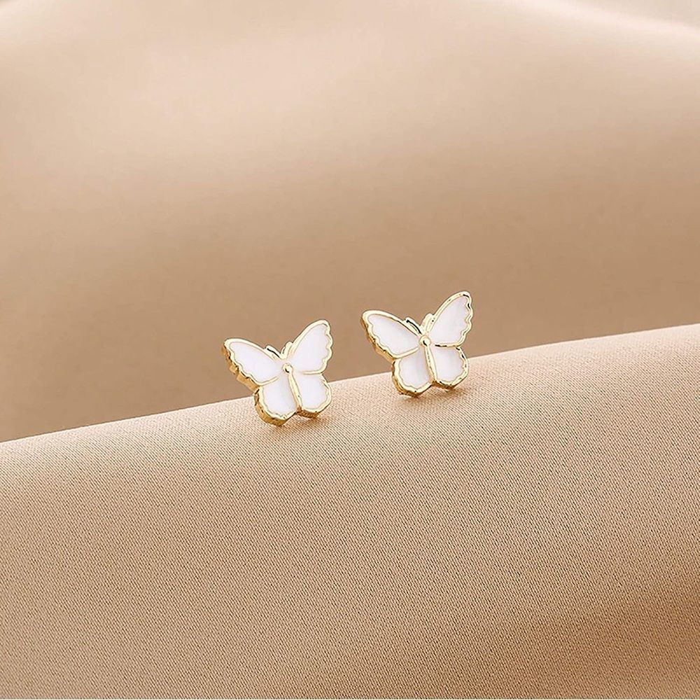 Tiny Petite beautiful pearl-colored butterfly earrings. - Picture 1 of 9